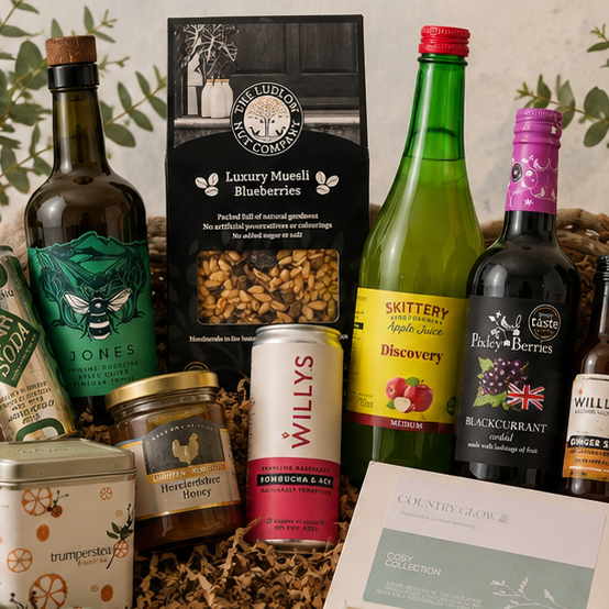Wellness gift hamper with apple juice, kombucha, tea and wax melts
