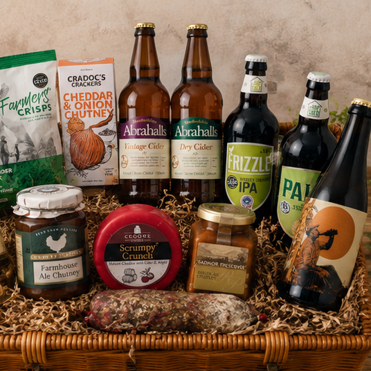 British craft cider and ale tasting selection with artisan savoury snacks