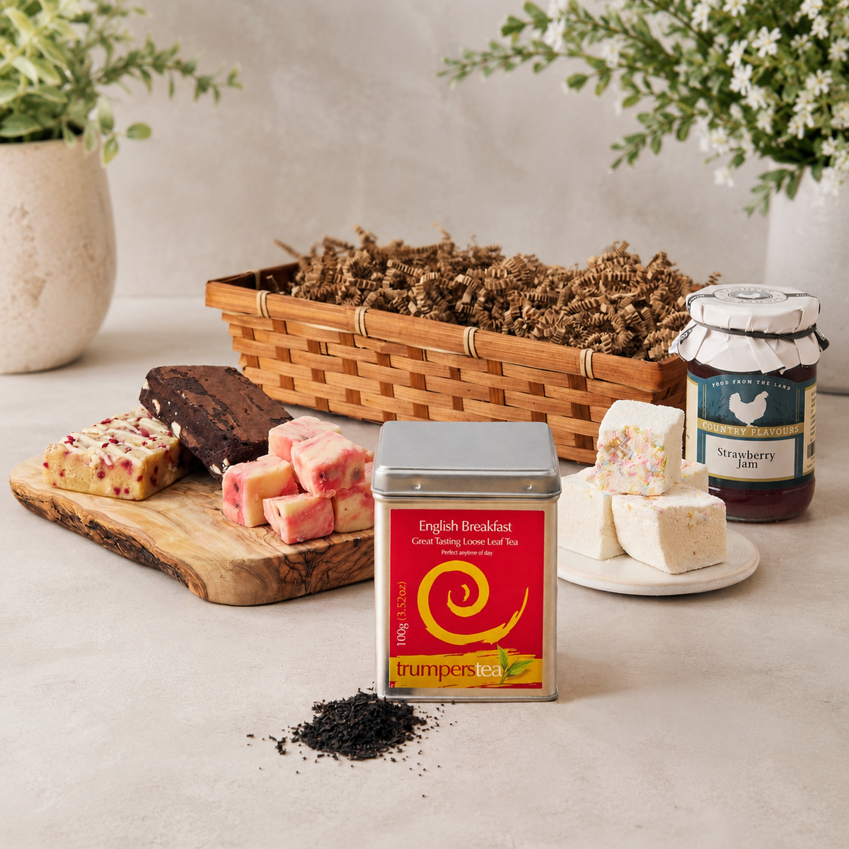 Tea Time Treats hamper with English Breakfast tea, strawberry jam and artisan sweet treats