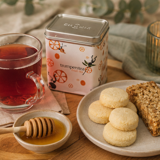 Self-care gift hamper with fruit tea, honey, kombucha and relaxing treats